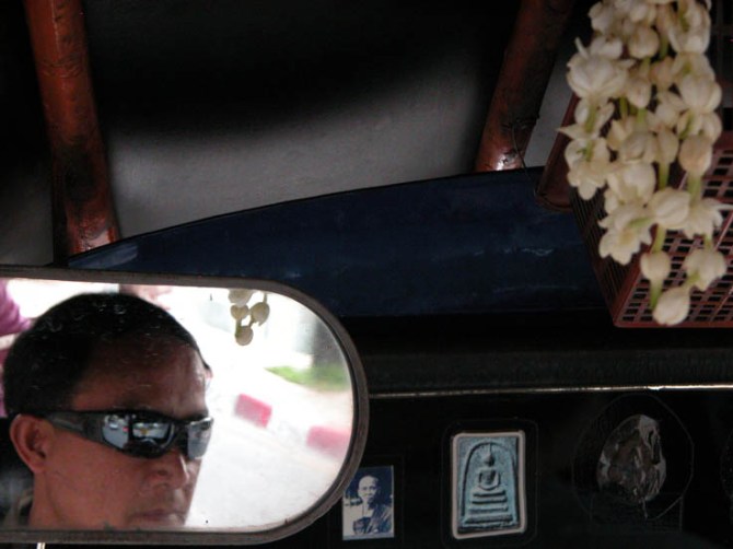 Our very cool tuktuk driver on our last tuktuk ride around Chiang Mai.