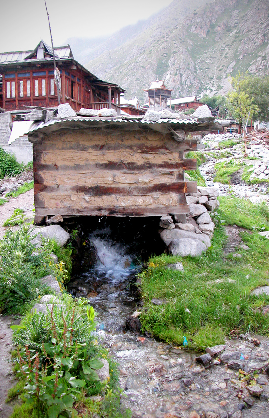 A millhouse straddles one of the streams in Chitkul.