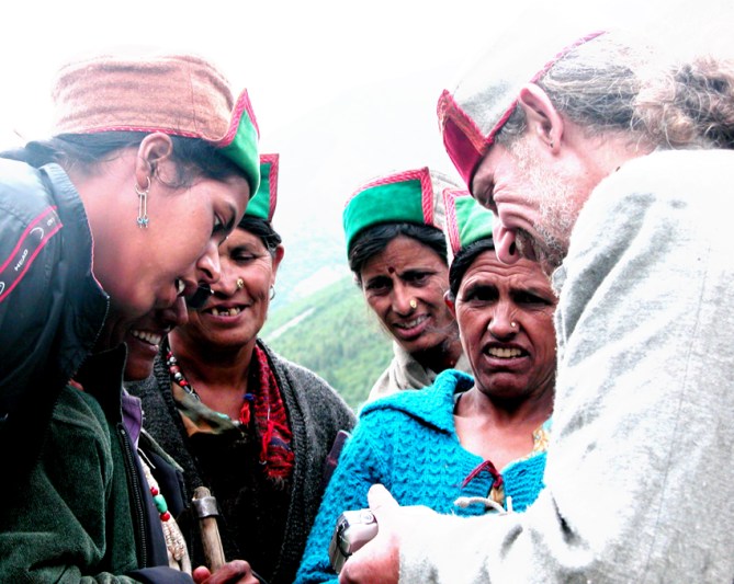 The local ladies marvelling at the technology we bought with us (digital camera) and getting all gaga over the cute little girls on the video. 
