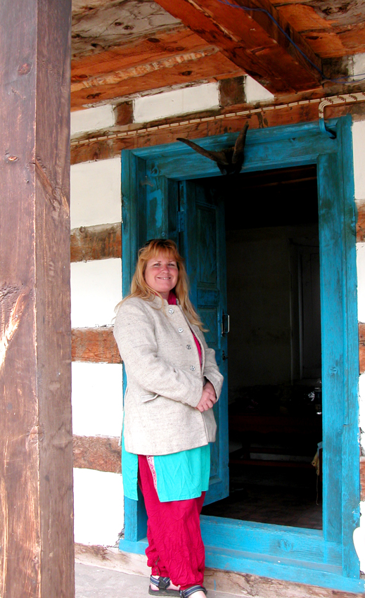 Me at the goatshorn-topped entrance of our room, Chitkul.