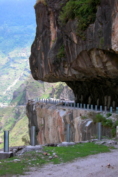 The mountains have jaws, and now and again they clamp down on a passing bus or truck.