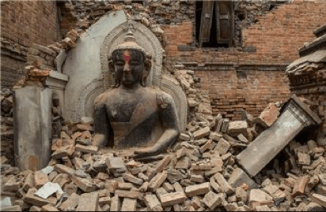 A Buddha statue surrounded by rubble in the Nepal 2015 earthquake. Picture by Al Jazeera English